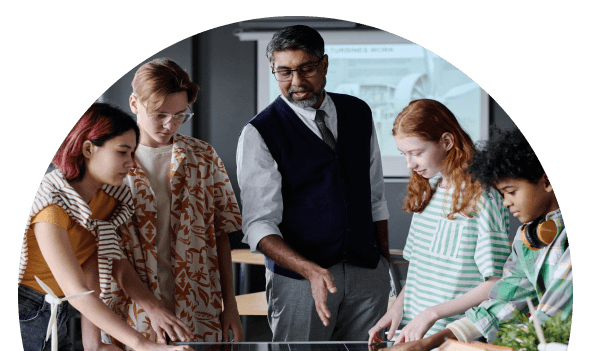 A semicircle of a photo showing office workers gathered round a solar panel